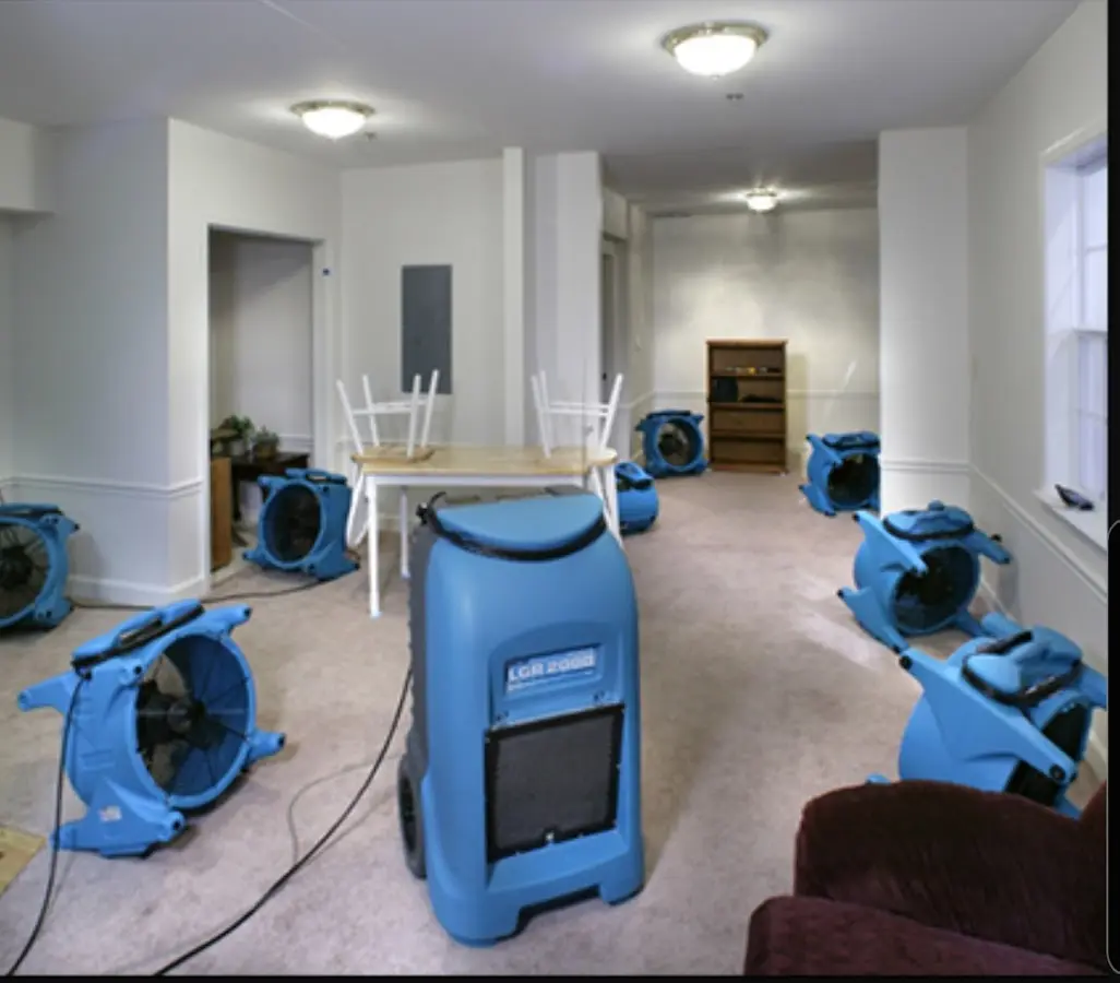 Air movers and dehumidifier setup for Water Damage Restoration in Norway